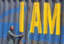 The final push – Help get the Container of Hope to its destination Ugandan Program Coordinator Henry with the container.