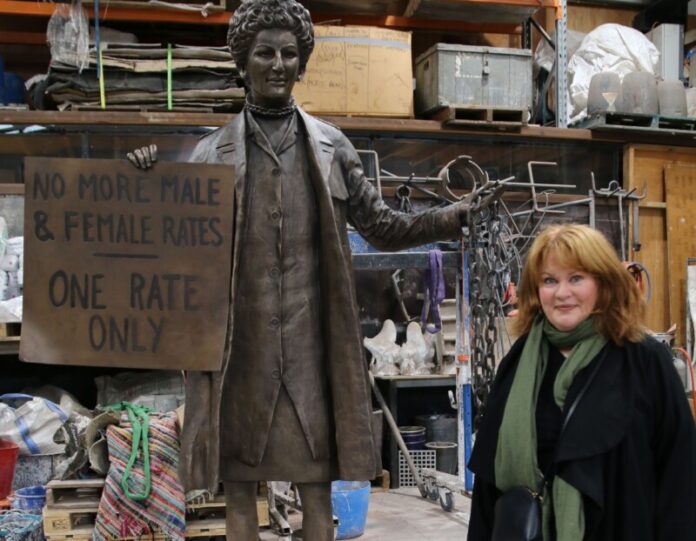 Internationally acclaimed figurative and portrait sculptor Jennifer Mann is pictured with her work featuring Australian activist Zelda D’Aprano.