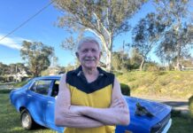 My Castlemaine with Jack Finning Jack with his '75 Datsun with his boots that he wore in the '75 game on the hood, with mud left over from his last ever game.