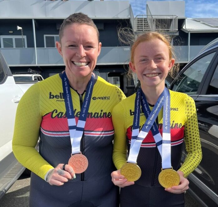 Emma and Chloe Jackson are proudly pictured with their medals.