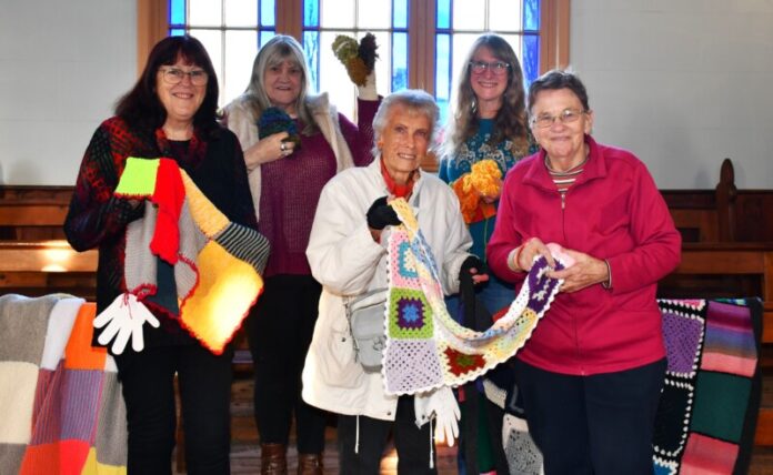 Kathy, Elizabeth, Heather, Pam and Flo were some of the local crafters who made blankets for people affected by the January bushfire.
