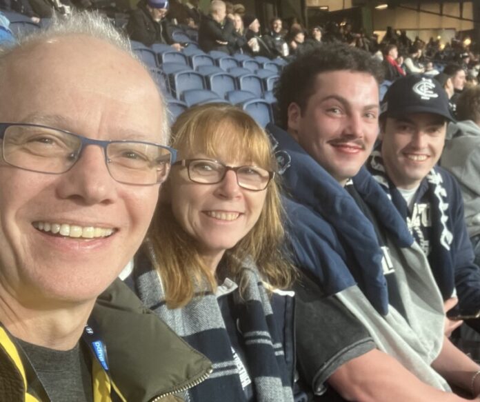 Darren and his wife, Wonona and two of their boys, Ryan and Lachlan, enjoying a Carlton game.