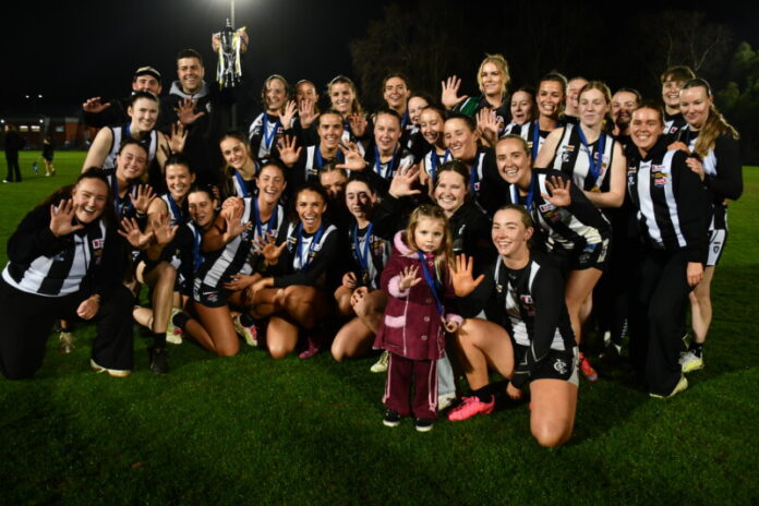 The Castlemaine Magpies celebrate their fifth consecutive flag in the AFL Central Vic Women's Football League. Photo: Lisa Dennis
