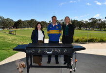 Beating heart of Harcourt awarded $25,000 Lisa Chesters, Mark Dorian, and Lisa Harrison having a look at the club's barbecue, which is being held together with zip ties and electrical tape.